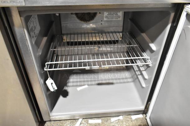 2019 Delfield 406P-STAR2 stainless steel single door undercounter cooler, with wire shelf, on commercial casters. Model label visible.
