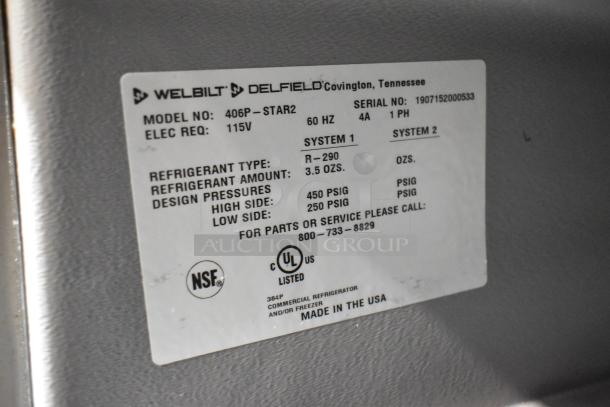 2019 Delfield 406P-STAR2 undercounter cooler label, shows model, refrigerant type R-290, serial number, and NSF certification.