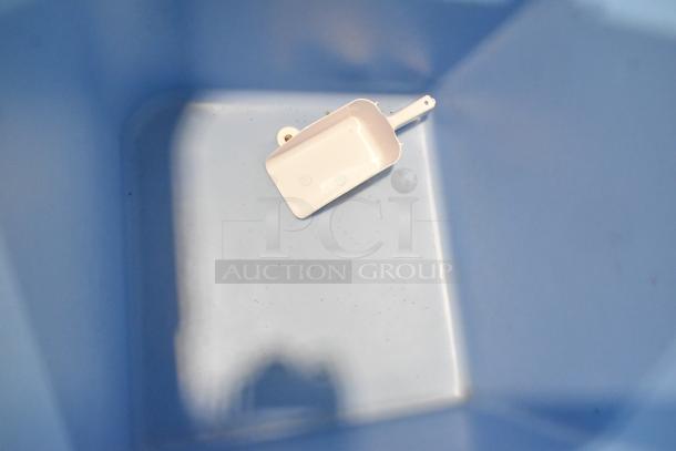 BRAND NEW Ice-O-Matic B55PSC commercial ice bin, stainless steel, with minor scratches and dents. Includes white ice scoop.