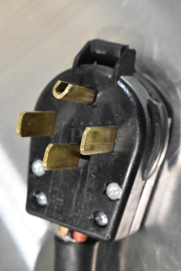 2023 Hobart LXER stainless steel commercial undercounter dishwasher plug, showing three-prong connection for 120/208-240 volts.