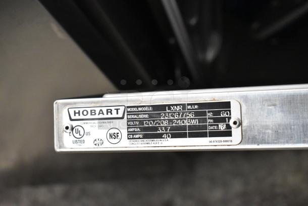 Hobart LXNR stainless steel undercounter dishwasher label showing model, serial number, voltage, and certifications.