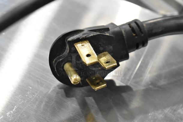 Hobart LXNR dishwasher's power plug, 120/208-240V, 1 phase, on a stainless steel surface, emphasizing commercial use connectivity.