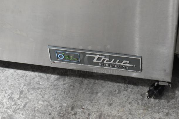 2024 True TUC-27-HC stainless steel undercounter cooler, single door, commercial casters, natural refrigerant label.