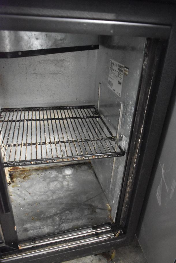 True TBB-24-48G-SD 2 Door Under-counter Back Bar Cooler. Metal interior, commercial casters, 115 Volts, label inside.