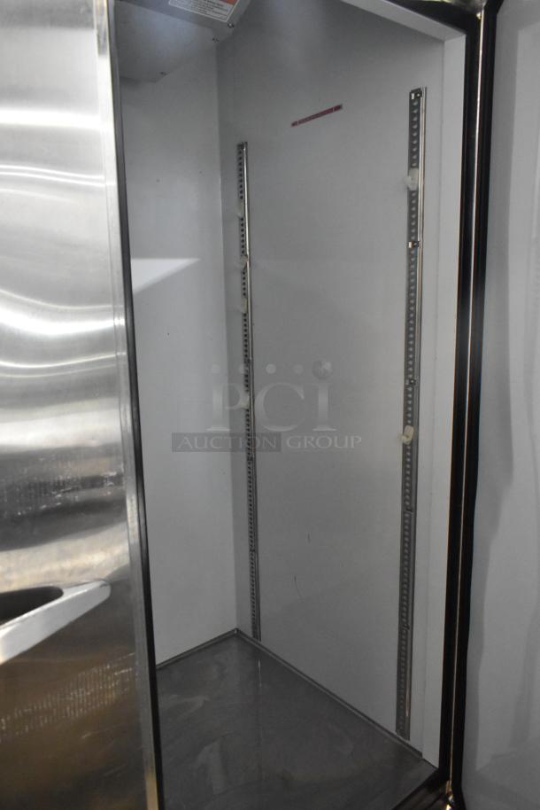 Stainless steel Beverage Air 2 Door Reach In Cooler, poly coated racks, commercial casters, 115V, 1 phase.