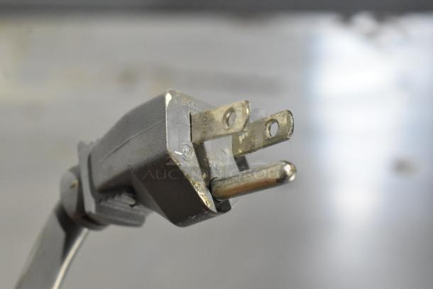 Power plug close-up of a Beverage Air stainless steel commercial 2-door cooler, 115 volts, 1 phase.