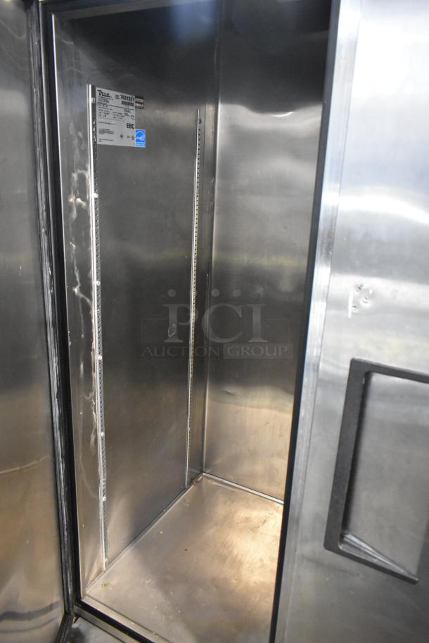 True TS-43 Stainless Steel 2 Door Reach-In Cooler, 115V, 1 Phase. Clean interior, visible model label with specs.
