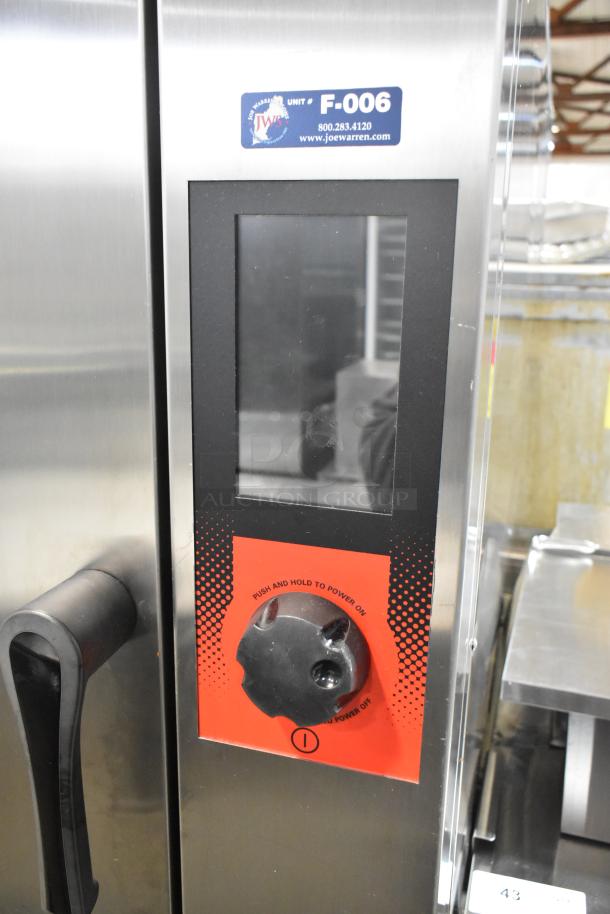 2022 Vulcan V1PJ102E-86 stainless steel electric combi convection oven, 208 volts, excellent condition, features control panel and handle.