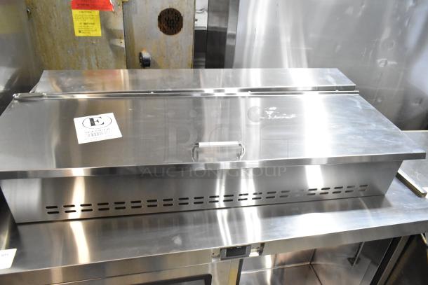 Atosa MSF8302GR stainless steel salad prep table on casters, missing lid and door, 115V, 1 phase, with visible label.