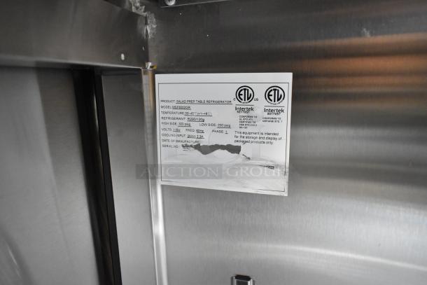 Atosa MSF8302GR commercial prep table; stainless steel, missing lid and door, ETL certified; label shows voltage and refrigerant details.