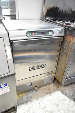 Hobart LX30H stainless steel undercounter dishwasher, 120/208V, 1 phase, good condition, visible controls and brand label.
