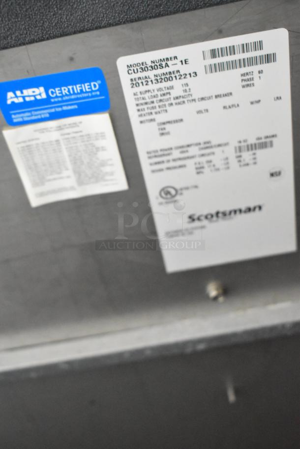 2020 Scotsman CU3030SA-1E stainless steel ice machine, self-contained, 115V, 1 phase. Label details model and certification.