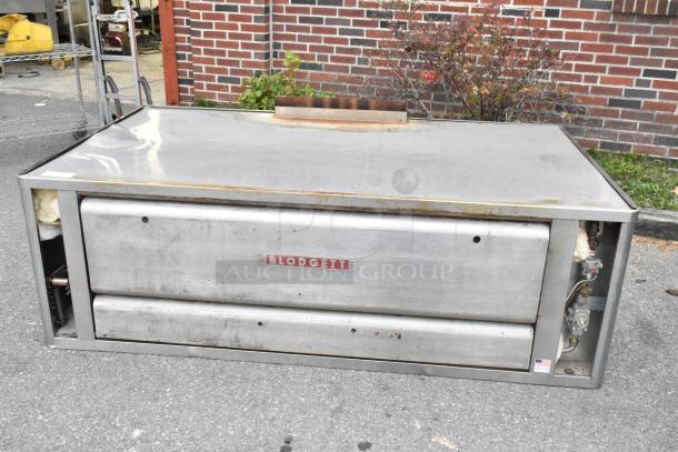 Blodgett 1060B stainless steel commercial propane pizza oven, single deck, 85,000 BTU, label visible, sturdy build.