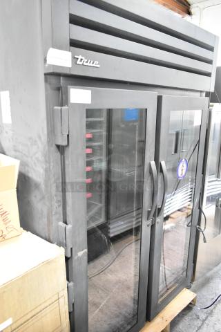 True 2024 STG2RPTVLD-2G-2S-HC commercial 2-door reach-in cooler merchandiser; right door locked, poly-coated racks.