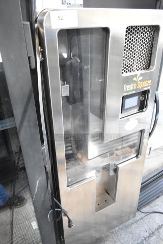 JBT 2nd-Gen-MFJ-HE commercial citrus juicer, stainless steel, Fresh N Squeeze brand, on casters, tested and working, 120V, 1 phase.