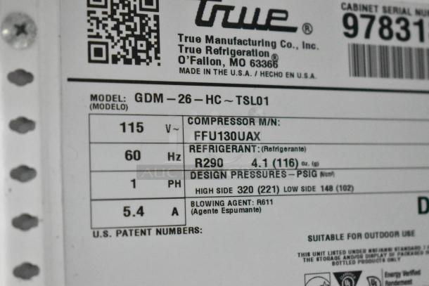 Label for True GDM-26-HC cooler, showing model details, voltage (115V), refrigerant (R290), and manufacturing info.