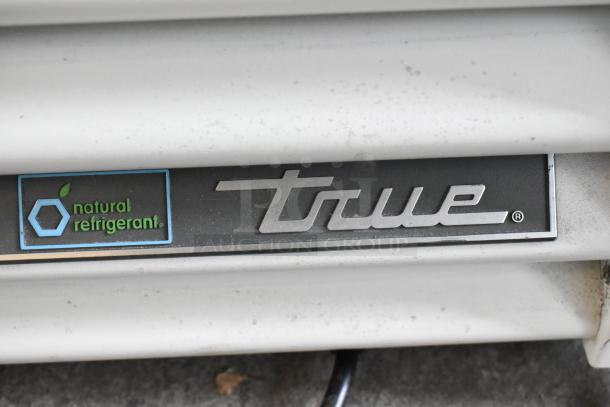 2021 True TSCI-600R-G-PH cooler with poly-coated racks. Features include natural refrigerant label. 115V, 1 phase.