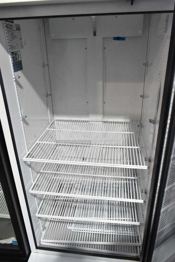 2021 True TSCI-600R-G-PH single door cooler with poly-coated racks, metal construction, 115V, 1 Phase. Mint condition.
