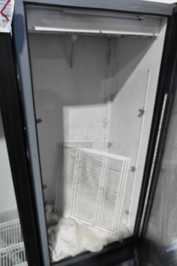 2021 True GDM-12-HC commercial cooler with single glass door and poly coated racks, visible interior and clean condition.