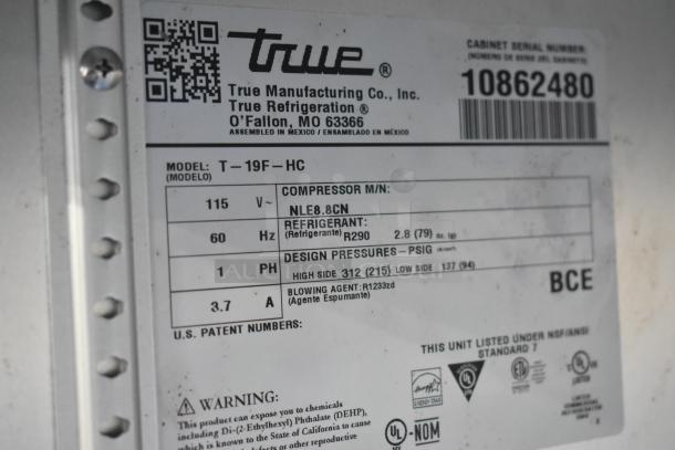 Label of a True T-19F-HC commercial freezer showing model, power specs, and refrigerant type.