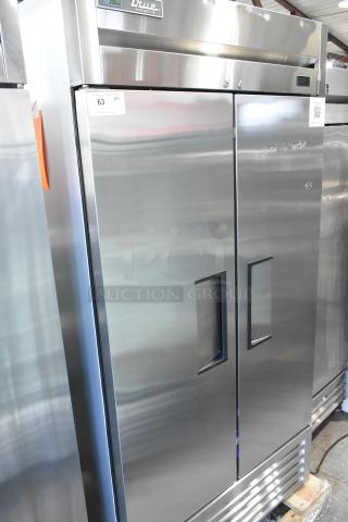Brand new True T-35-HC stainless steel 2-door reach-in cooler with scratches. Includes poly coated racks, 115V, 1 phase.
