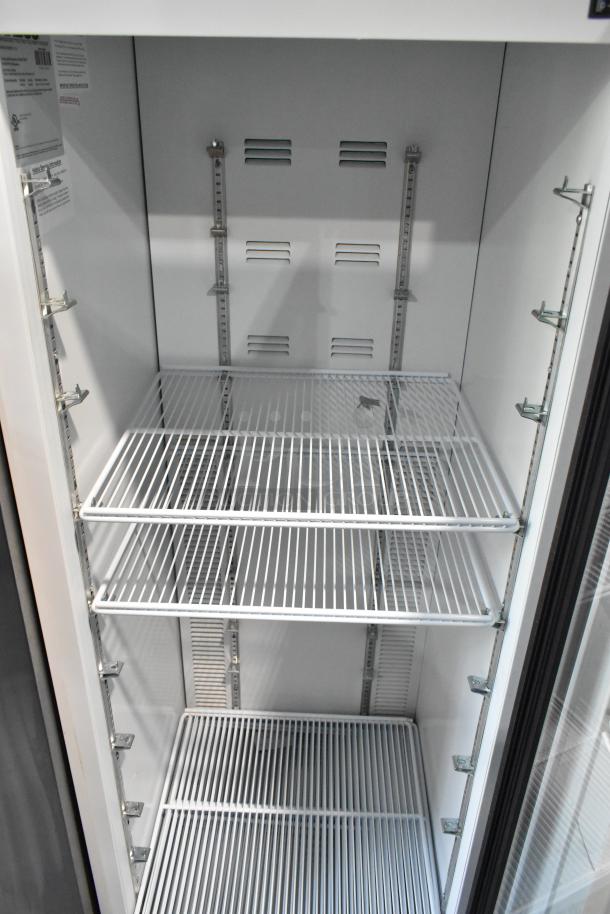 2019 Habco SE18 commercial cooler, single glass door, poly-coated racks, 115V, excellent condition, ideal for merchandisers.