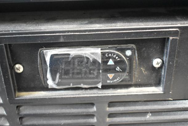 2019 Habco SE18 cooler display panel with temperature control buttons. Tape residue and minor dust visible.