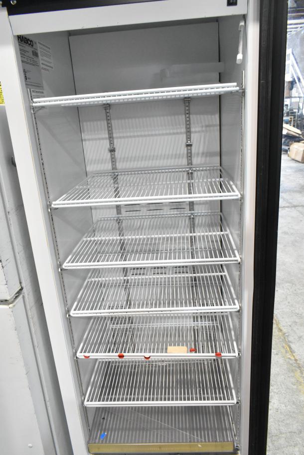 2019 Habco SE18 single door reach-in cooler, metal, poly-coated racks, 115V, 1 phase, commercial use, excellent condition.