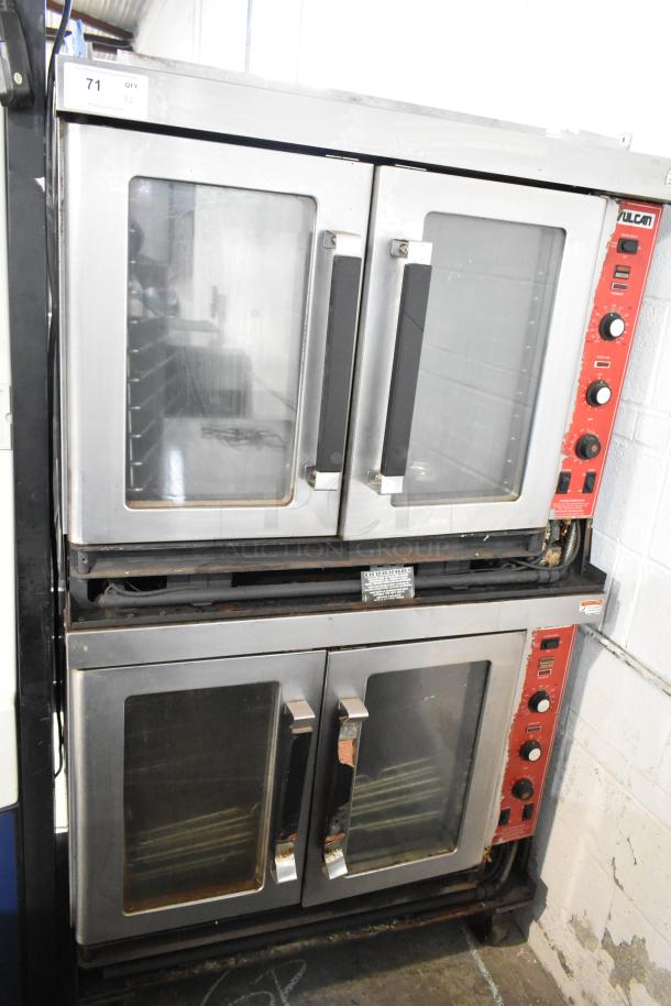 2 Vulcan full-size convection ovens with view-through doors, metal racks, thermostatic controls, stainless steel, used.