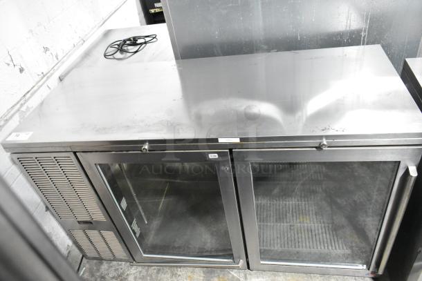 Perlick BS60 Metal Commercial 2 Door Back Bar Cooler Merchandiser, 115V, 1 Phase, with glass doors and metal top, used condition.