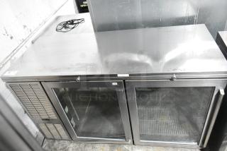 Perlick BS60 Metal Commercial 2 Door Back Bar Cooler Merchandiser, 115V, 1 Phase, with glass doors and metal top, used condition.