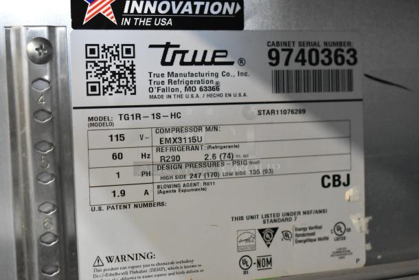 2019 True TG1R-1S-HC cooler label, 115 volts, 1 phase, R290 refrigerant, model and serial numbers visible on stainless steel.