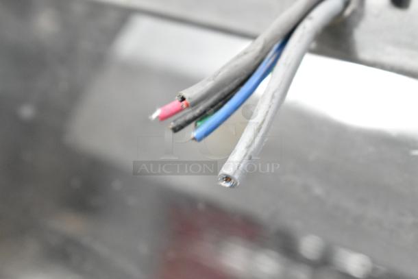 Close-up of wires for Superior 5186INF Metal Commercial Tortilla Cooling Conveyor, 230V, 1 Phase.