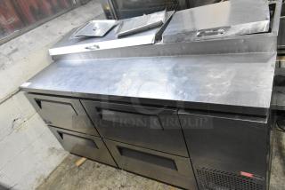 Turbo Air TPR-67SD-D4 stainless steel pizza prep table with 4 drawers, 115 volts, 1 phase, lightly used condition.