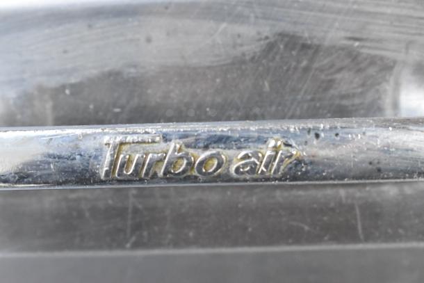 Turbo Air TPR-67SD-D4 stainless steel commercial pizza prep table, featuring 4 drawers, 115 volts, 1 phase.