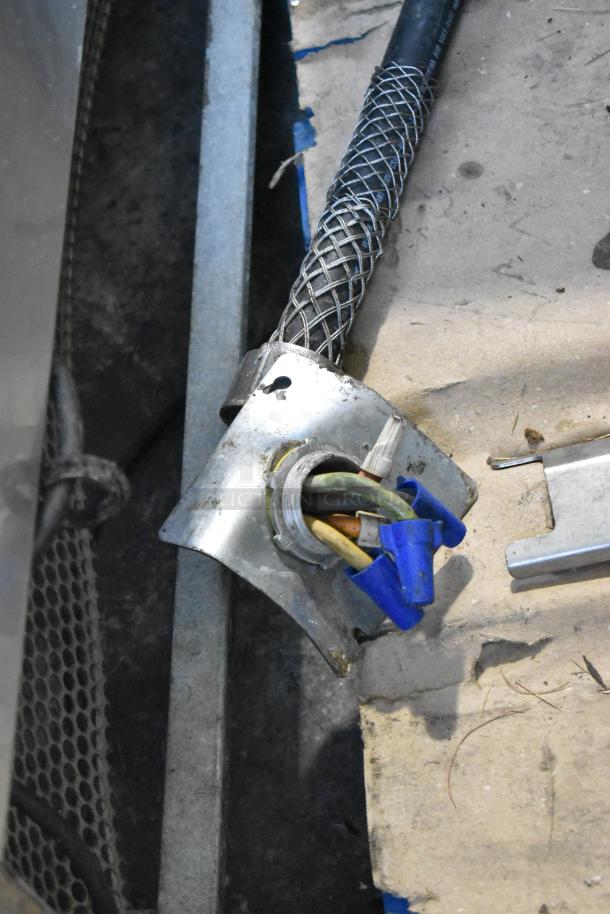 Wiring and connector detail for Alto Shaam AR-7T electric rotisserie oven, showing braided cable and connector in good condition.