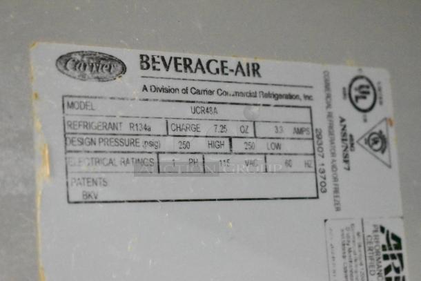 Beverage Air UCR48A stainless steel undercounter cooler label, showing model, refrigerant R134a, electrical specs: 115V, 1 phase.