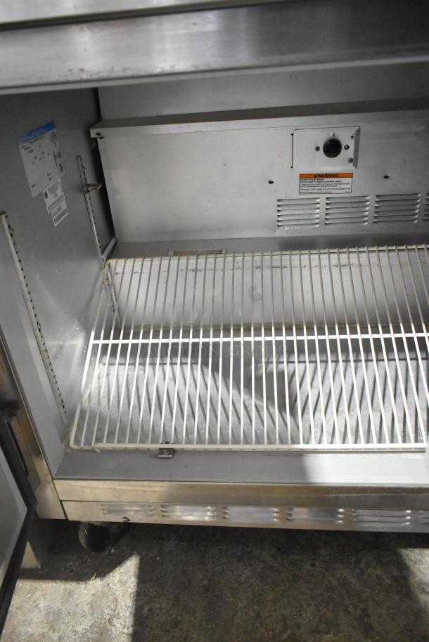 Beverage Air WTR60A stainless steel 2-door undercounter cooler on casters, 115V, 1 Phase, interior shelving visible.