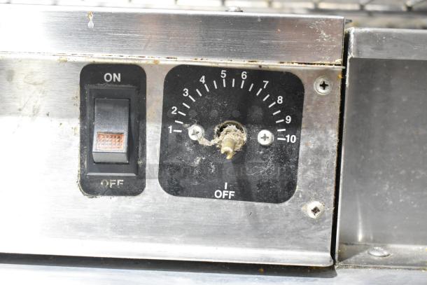 CresCor EB150 stainless steel heated holding cabinet control panel, showing on/off switch and temperature dial.