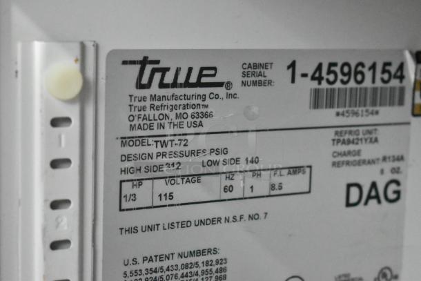 True TWT-72 work top cooler label showing model, voltage, and serial number. 115 volts, 1 phase. Made in USA.