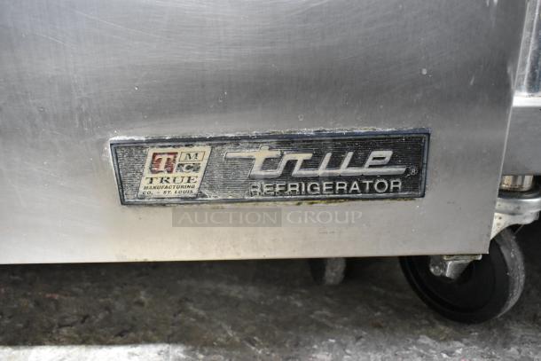 True TWT-72 stainless steel 3-door work top cooler; commercial grade; visible manufacturer's label; 115V, 1 phase.