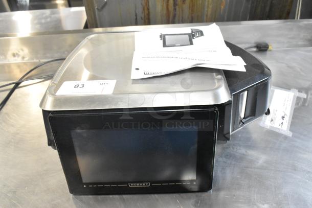 Hobart metal commercial countertop scale with digital display. Compatible with 120/208-240 Volts, 1 Phase. User manual included.