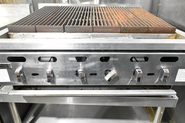 Vulcan VACB36-101 stainless steel commercial gas charbroiler grill on equipment stand with casters; 102,000 BTU, used.