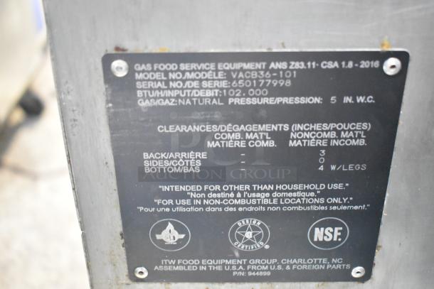 Vulcan VACB36-101 stainless steel charbroiler grill, natural gas, 102,000 BTU, on equipment stand with commercial casters. Model plate visible.