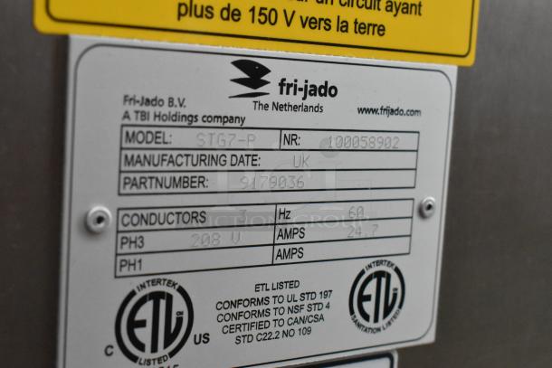 Fri-jado STG7-P rotisserie oven, stainless steel, 208V, 3-phase. Label shows model, part number, ETL listing.