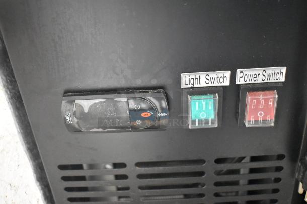 Avantco 178UBB72SHC 3-door back bar cooler with control panel, light switch, and power switch. 115V, 1 phase.