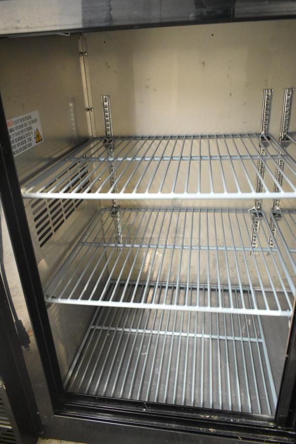 2025 Avantco 178UBB72SHC metal commercial 3-door back bar cooler. Features include wire shelves and 115V 1-phase power.