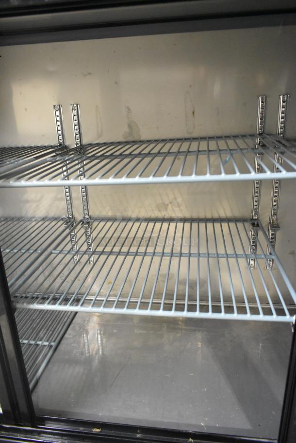 2025 Avantco 178UBB72SHC metal commercial back bar cooler with three doors, adjustable shelves. 115V, 1 phase. Clean interior.