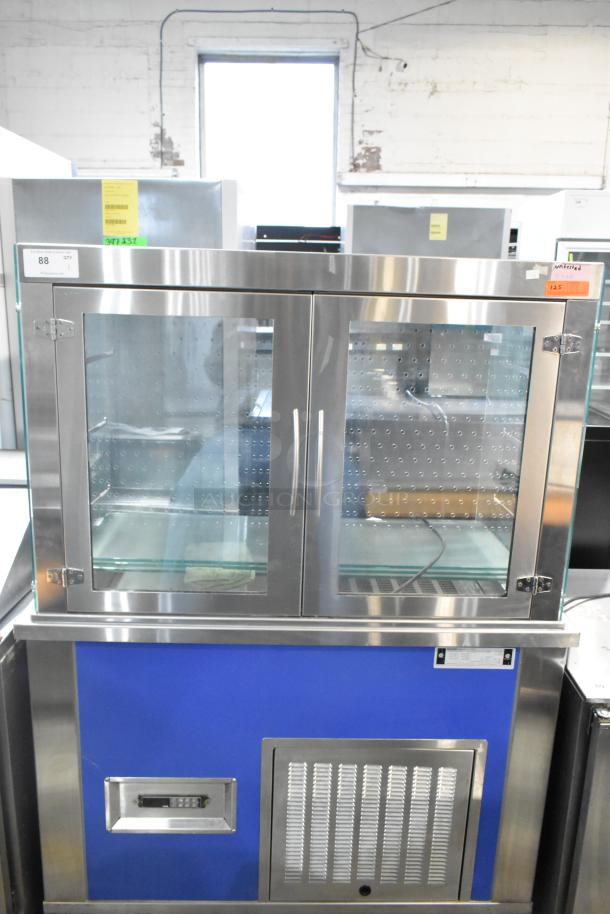Piper Products 4-OTR-2 stainless steel cold food display case, commercial grade, 208 volts, dual doors, clear glass front.