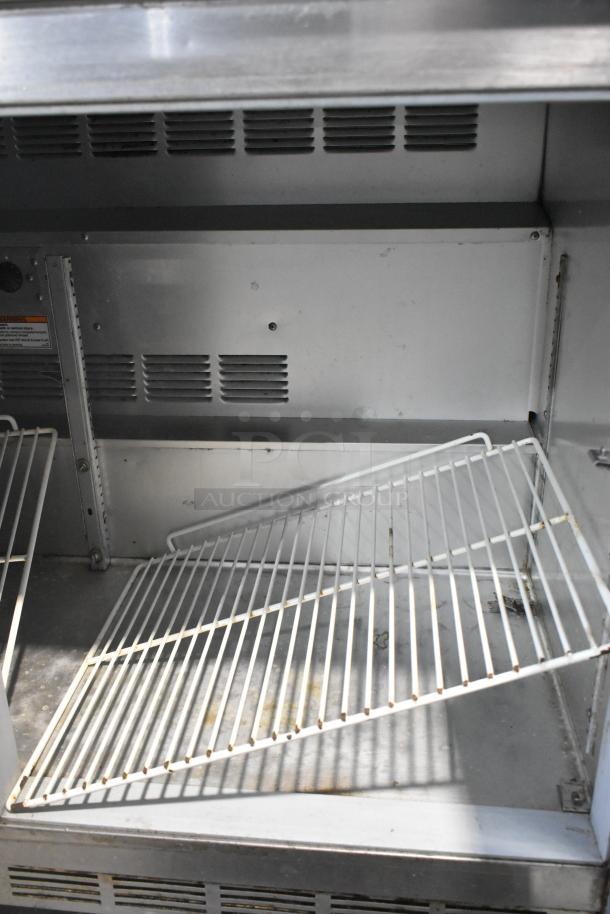 Beverage Air UCR48A stainless steel 2-door undercounter cooler, features adjustable wire shelves, good condition. 115 volts, 1 phase.